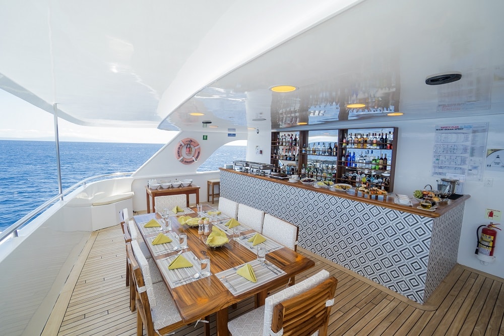 Al-fresco dining area at rear of yacht