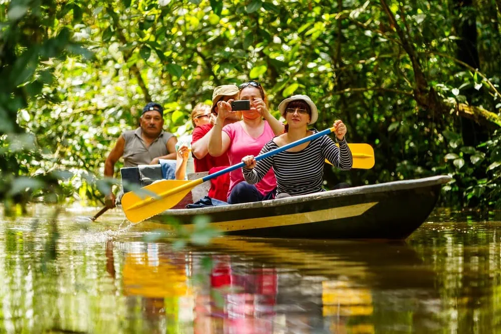Amazon River Canao with family of tourists and guide